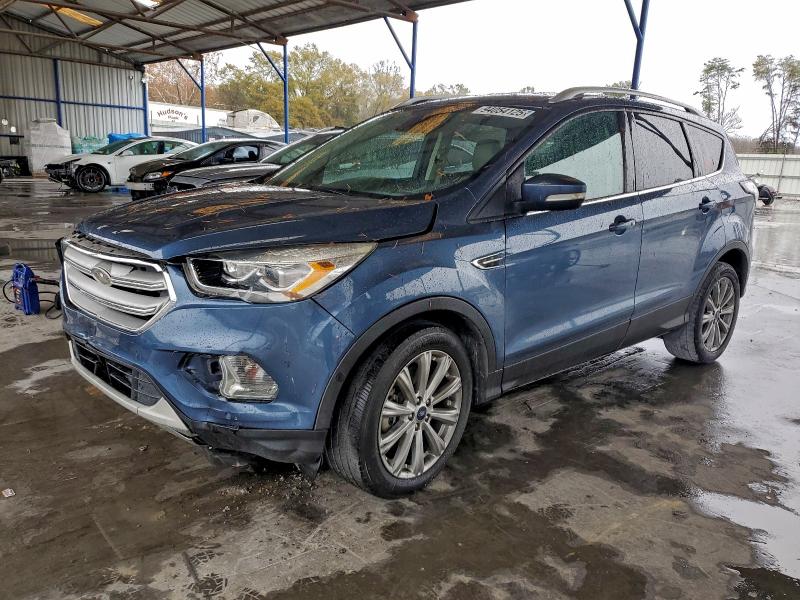 FORD ESCAPE TIT 2018 with VIN 1FMCU0J98JUC44385 - Photo from auction