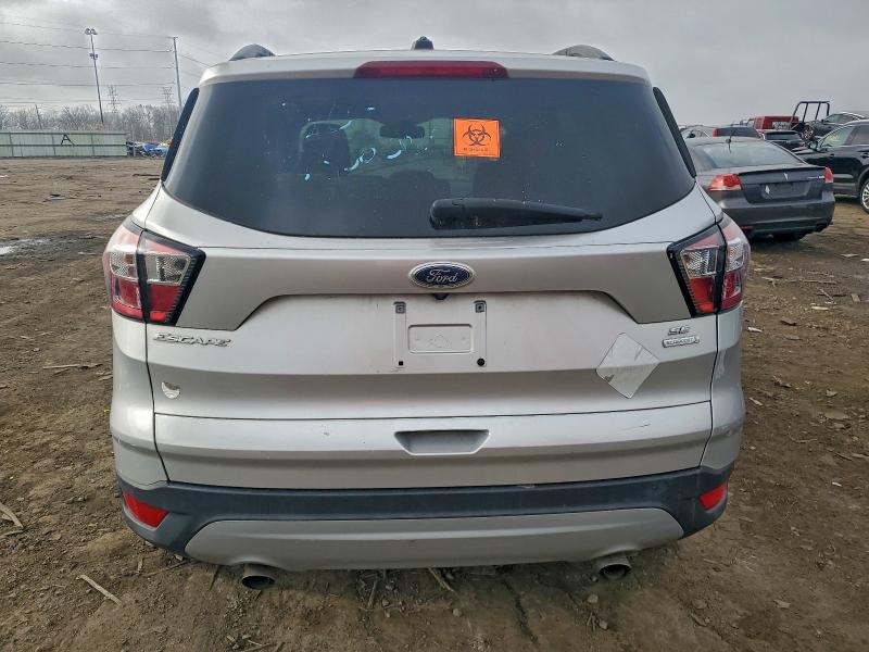 Photo 6 from auction – 2018 FORD ESCAPE SE with VIN 1FMCU0GD3JUC12438