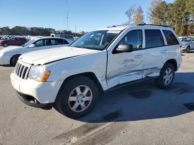 JEEP GRAND CHER 2010 with VIN 1J4PR4GK0AC151143 - Photo from auction