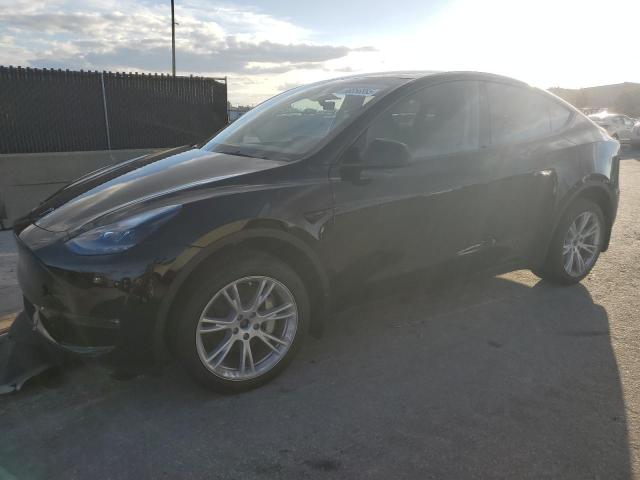 TESLA MODEL Y 2023 with VIN 7SAYGDEE7PA182866 - Photo from auction