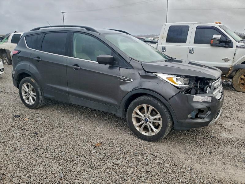 Photo 4 from auction – 2018 FORD ESCAPE SE with VIN 1FMCU0GD9JUD06856