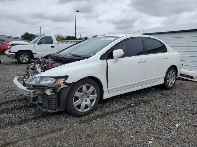 HONDA CIVIC LX 2010 with VIN 19XFA1F57AE078719 - Photo from auction