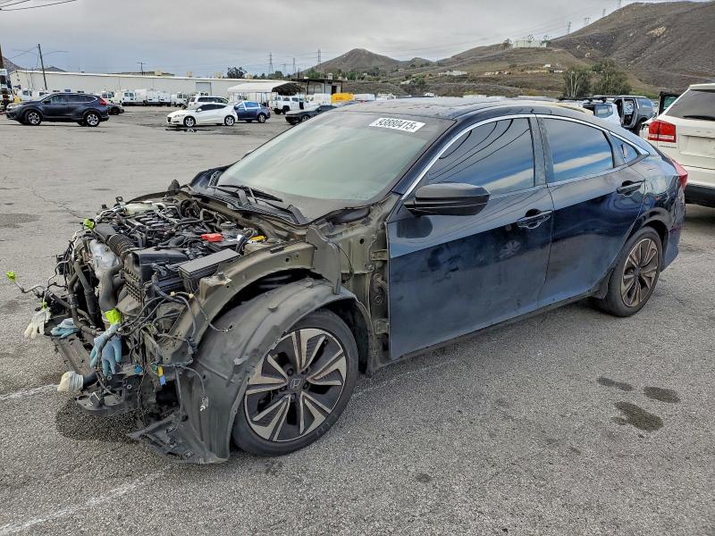 HONDA CIVIC EX 2017 with VIN 2HGFC1F32HH654838 - Photo from auction