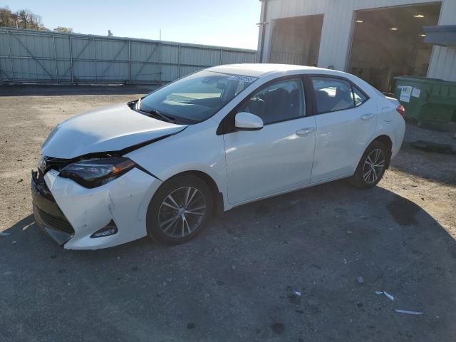 TOYOTA COROLLA L 2017 with VIN 5YFBURHE5HP620099 - Photo from auction
