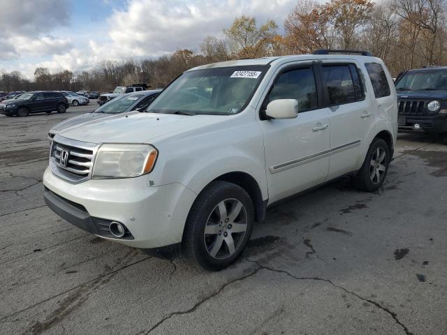 HONDA PILOT TOUR 2012 with VIN 5FNYF4H9XCB044119 - Photo from auction