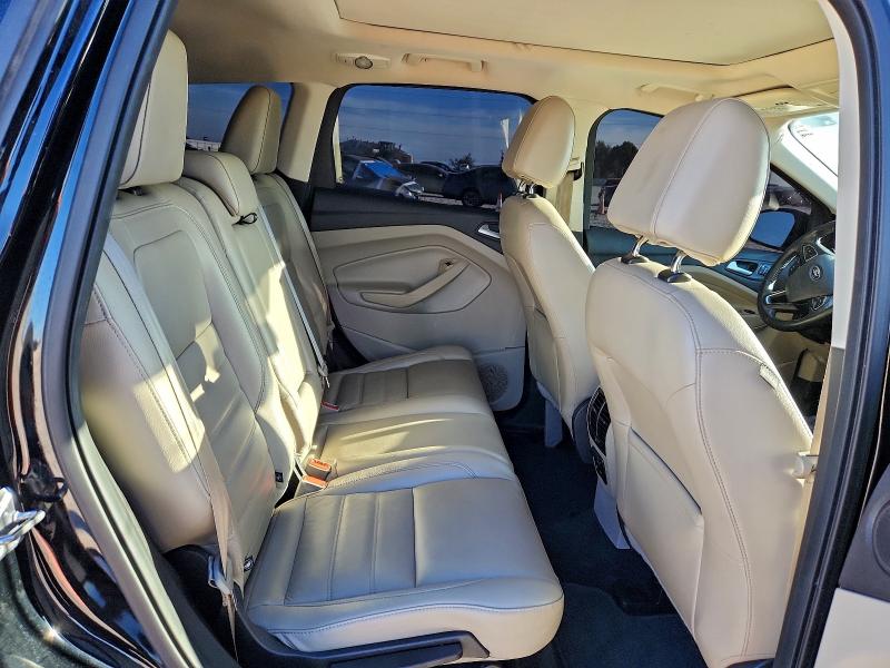 Photo 11 from auction – 2017 FORD ESCAPE TIT with VIN 1FMCU0J90HUE93905