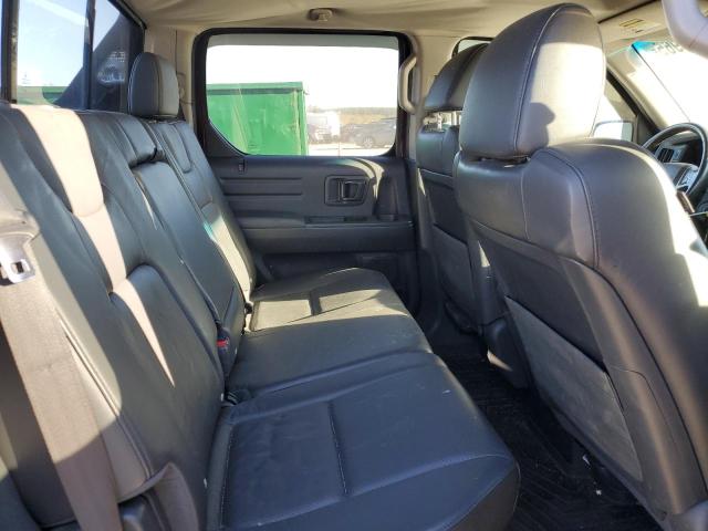 Photo 10 from auction – 2011 HONDA RIDGELINE with VIN 5FPYK1F51BB006679