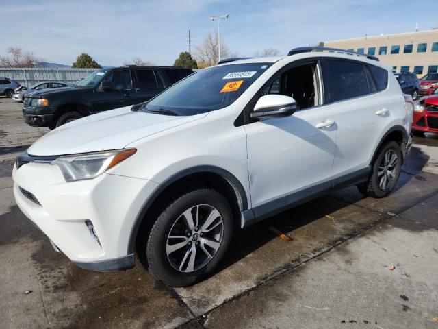 TOYOTA RAV4 XLE 2017 with VIN JTMRFREV7HJ108815 - Photo from auction