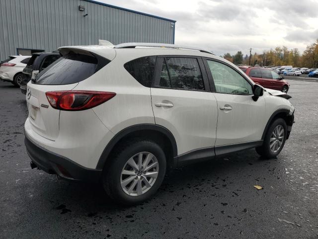 Photo 3 from auction – 2015 MAZDA CX-5 TOURI with VIN JM3KE2CYXF0523131