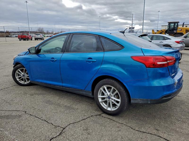 Photo 2 from auction – 2015 FORD FOCUS SE with VIN 1FADP3F27FL340136