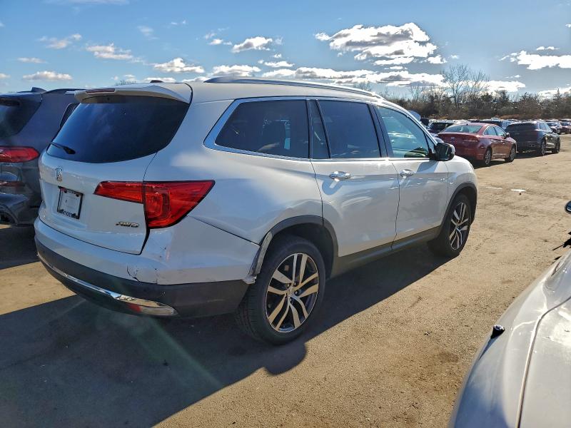 Photo 3 from auction – 2017 HONDA PILOT ELIT with VIN 5FNYF6H03HB068752