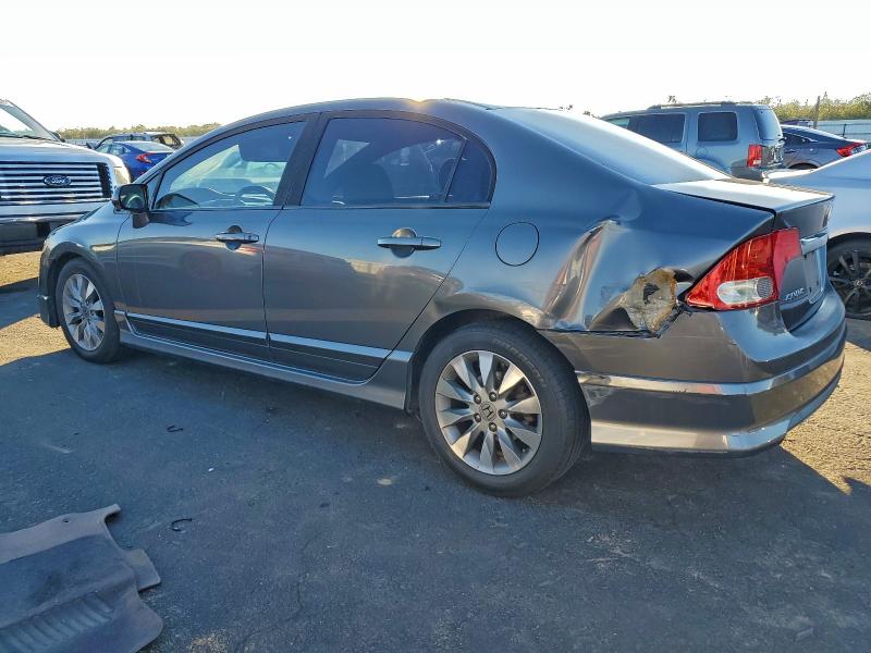 Photo 2 from auction – 2010 HONDA CIVIC EX with VIN 19XFA1F85AE072931