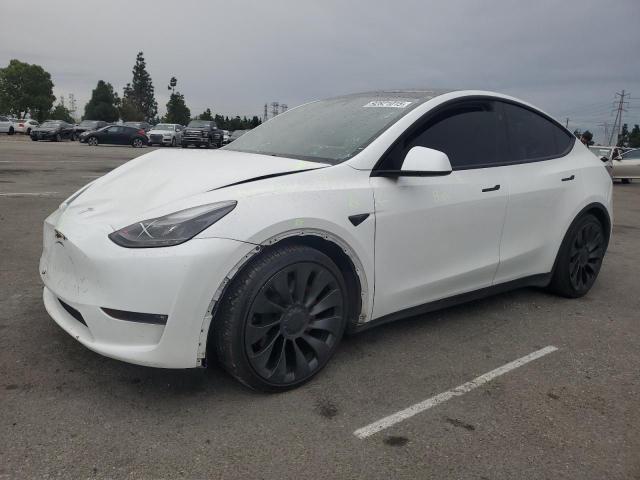 TESLA MODEL Y 2023 with VIN 7SAYGDEF6PF807611 - Photo from auction