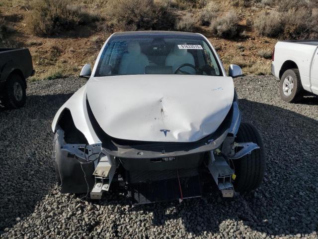 Photo 5 from auction – 2021 TESLA MODEL Y with VIN 5YJYGDEE8MF173329