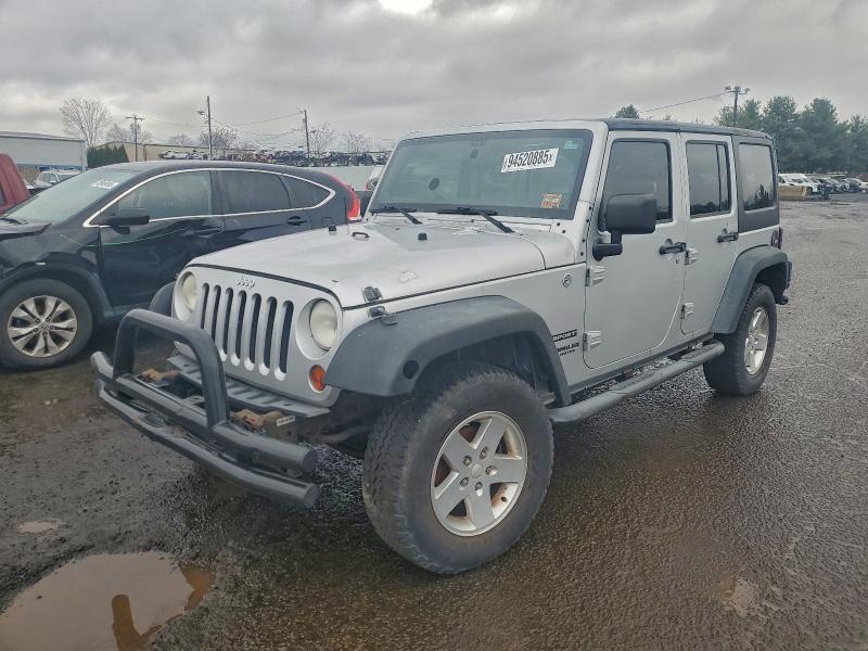 JEEP WRANGLER U 2011 with VIN 1J4BA3H1XBL557501 - Photo from auction