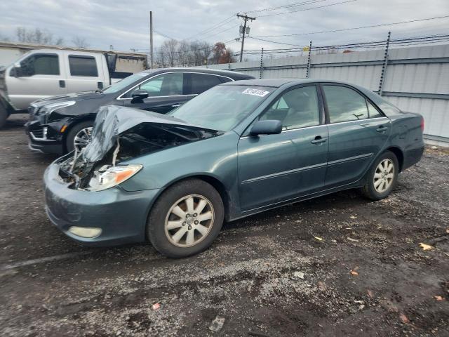 Photo 1 from auction – 2004 TOYOTA CAMRY LE with VIN 4T1BE30K04U273446