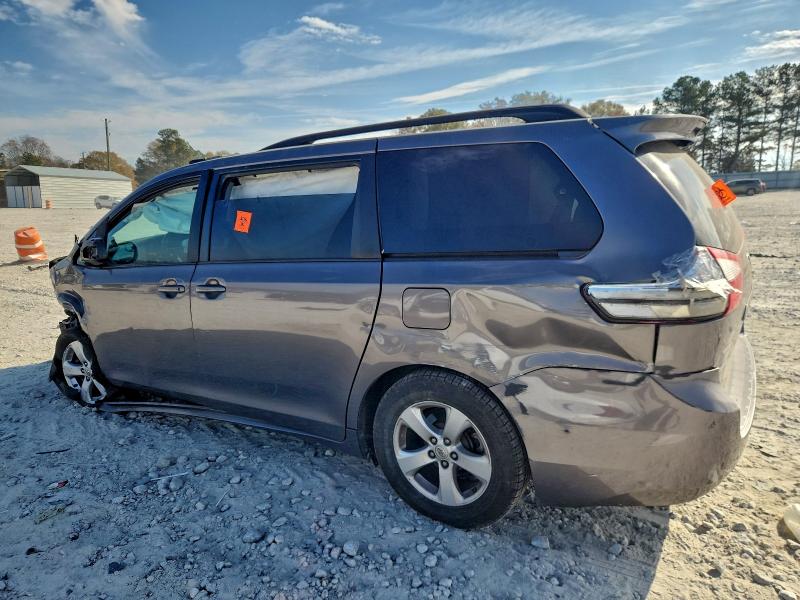 Photo 2 from auction – 2016 TOYOTA SIENNA LE with VIN 5TDKK3DC9GS726407