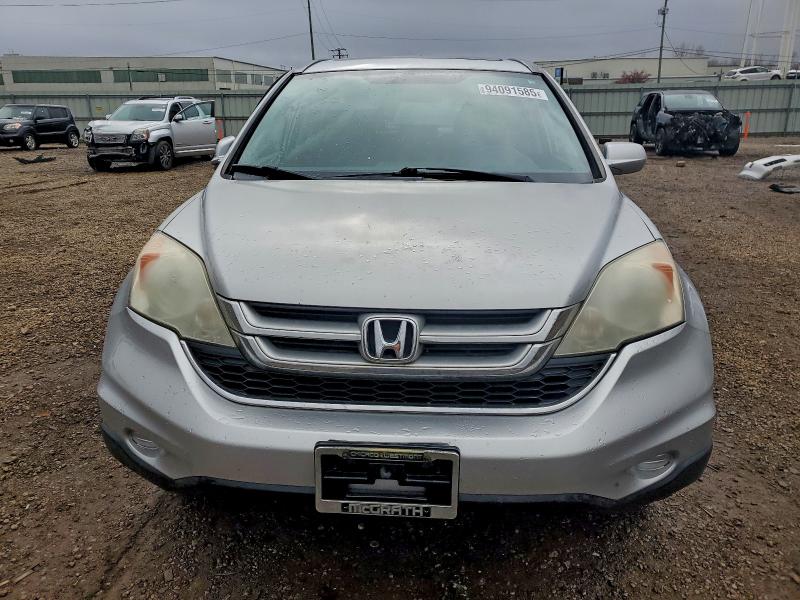 Photo 5 from auction – 2011 HONDA CR-V EXL with VIN 5J6RE3H74BL011591