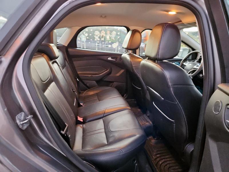 Foto 10 de la subasta – 2014 FORD FOCUS SE con VIN 1FADP3K28EL291047
