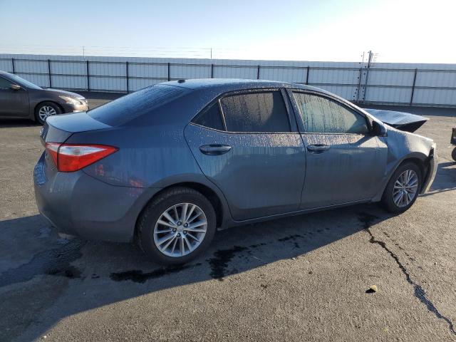 Photo 3 from auction – 2014 TOYOTA COROLLA L with VIN 5YFBURHEXEP113193