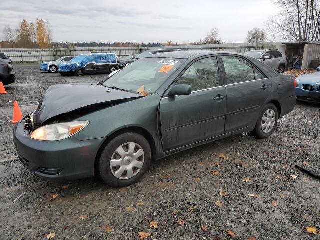 TOYOTA CAMRY LE 2002 with VIN JTDBE32K120060074 - Photo from auction