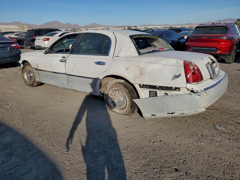 Photo 2 from auction – 2000 LINCOLN TOWN CAR E with VIN 1LNHM81W6YY837059