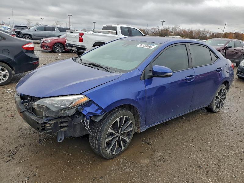 TOYOTA COROLLA 2018 with VIN 5YFBURHE4JP772641 - Photo from auction