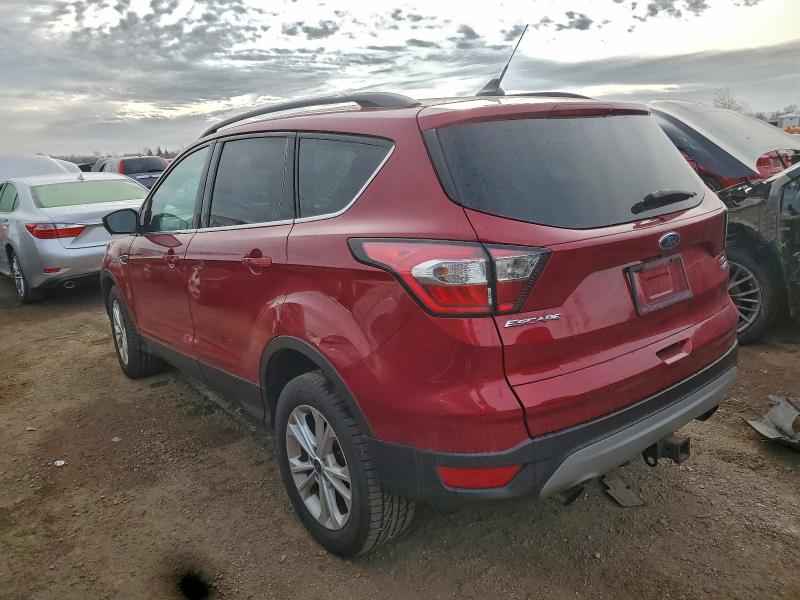 Photo 2 from auction – 2018 FORD ESCAPE SEL with VIN 1FMCU9HD4JUB68873