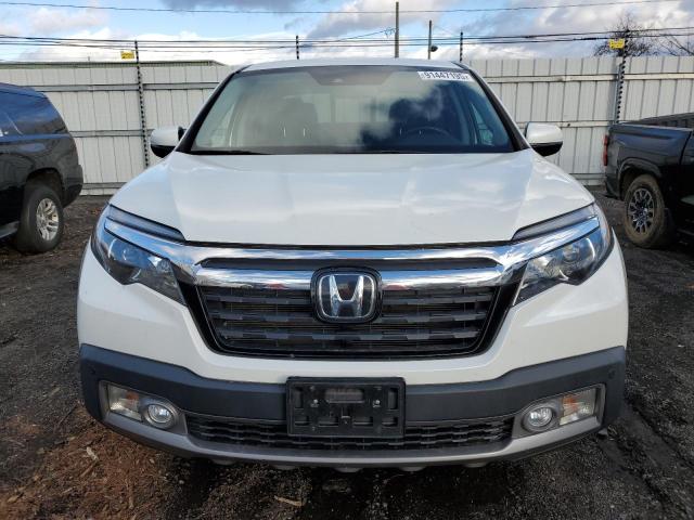 Photo 5 from auction – 2020 HONDA RIDGELINE with VIN 5FPYK3F75LB004626