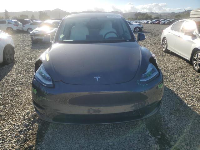 Photo 5 from auction – 2022 TESLA MODEL Y with VIN 7SAYGDEE2NF393554