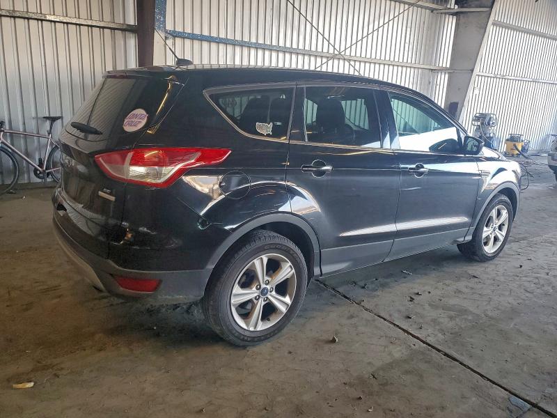 Photo 3 from auction – 2016 FORD ESCAPE SE with VIN 1FMCU0GX0GUB01493