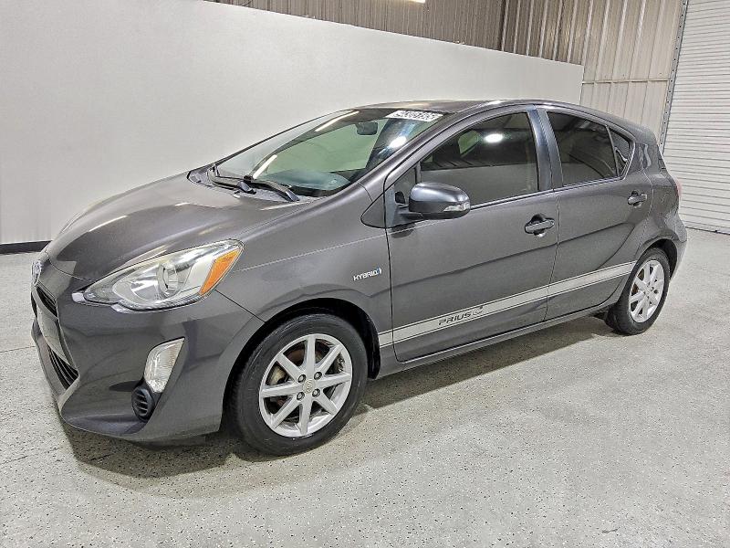 TOYOTA PRIUS C 2015 with VIN JTDKDTB34F1583942 - Photo from auction