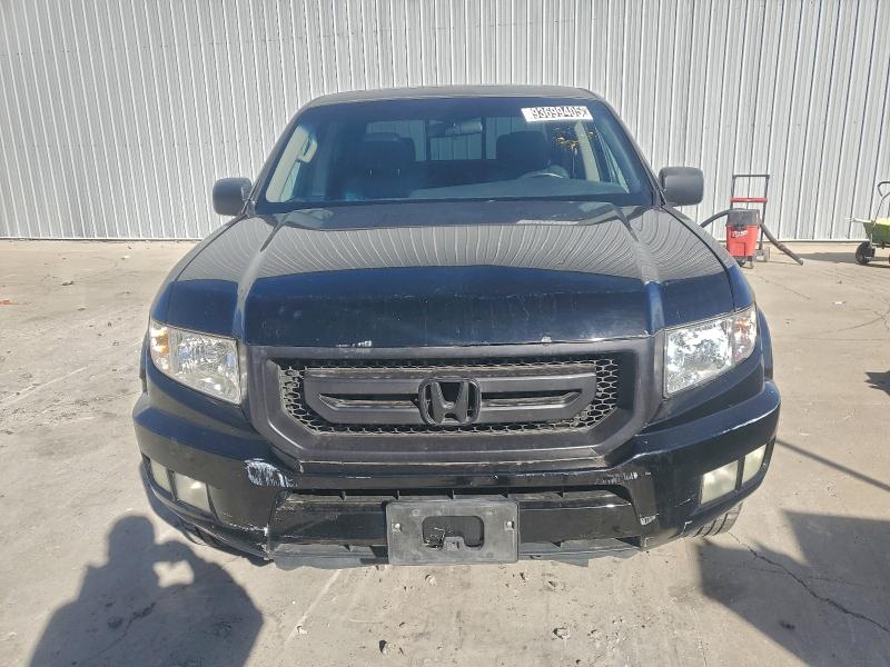 Photo 5 from auction – 2011 HONDA RIDGELINE with VIN 5FPYK1F52BB003810