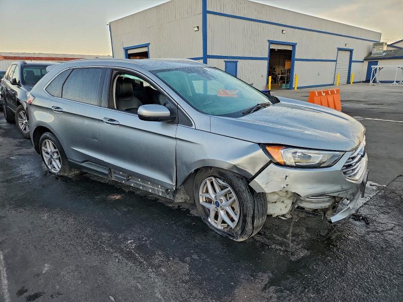 Photo 4 from auction – 2021 FORD EDGE SEL with VIN 2FMPK3J94MBA27404
