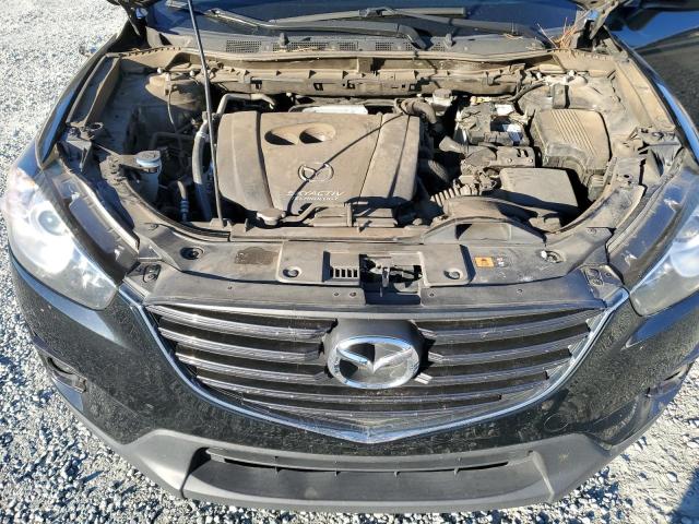 Photo 12 from auction – 2016 MAZDA CX-5 TOURI with VIN JM3KE2CY9G0680974