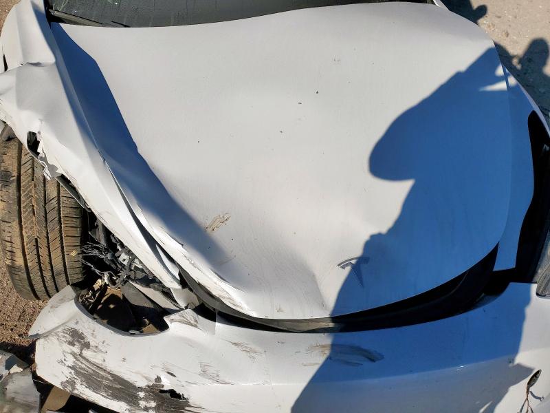 Photo 11 from auction – 2021 TESLA MODEL 3 with VIN 5YJ3E1EB9MF990510