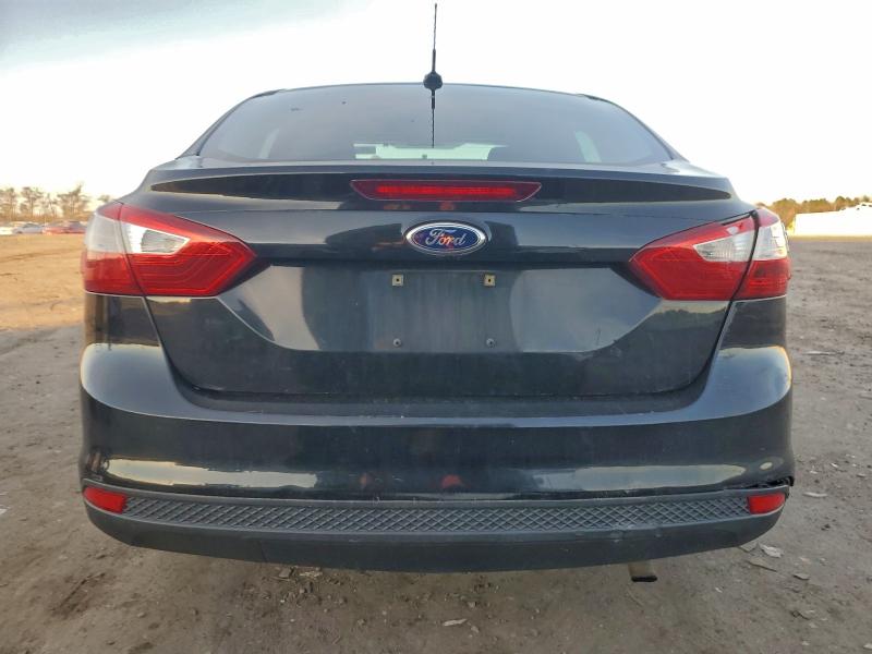 Photo 6 from auction – 2014 FORD FOCUS S with VIN 1FADP3E25EL191824