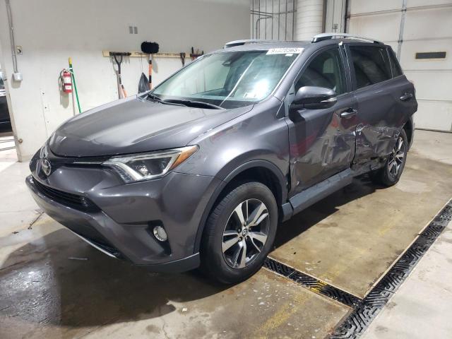 TOYOTA RAV4 XLE 2017 with VIN 2T3RFREV0HW609174 - Photo from auction