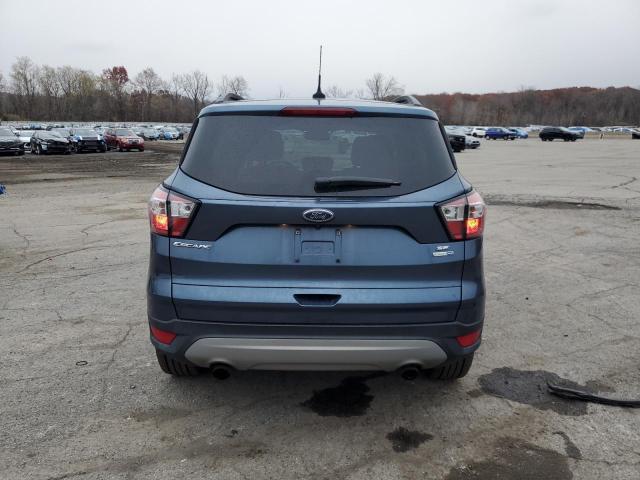 Photo 6 from auction – 2018 FORD ESCAPE SE with VIN 1FMCU9GD6JUC25124