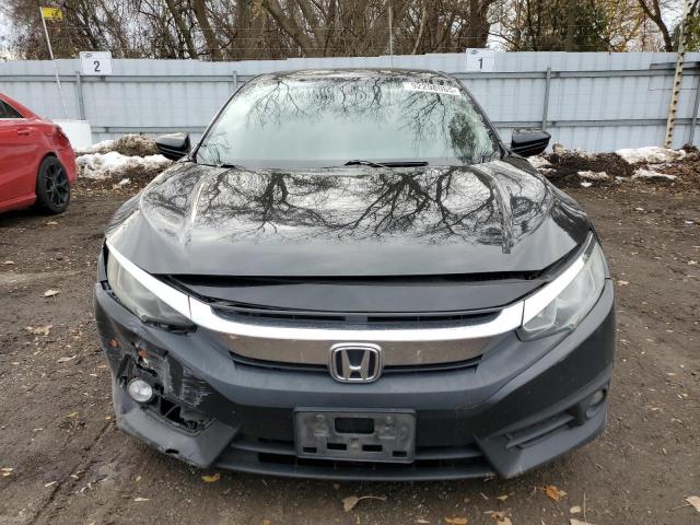 Photo 5 from auction – 2016 HONDA CIVIC LX with VIN 2HGFC2E52GH007184