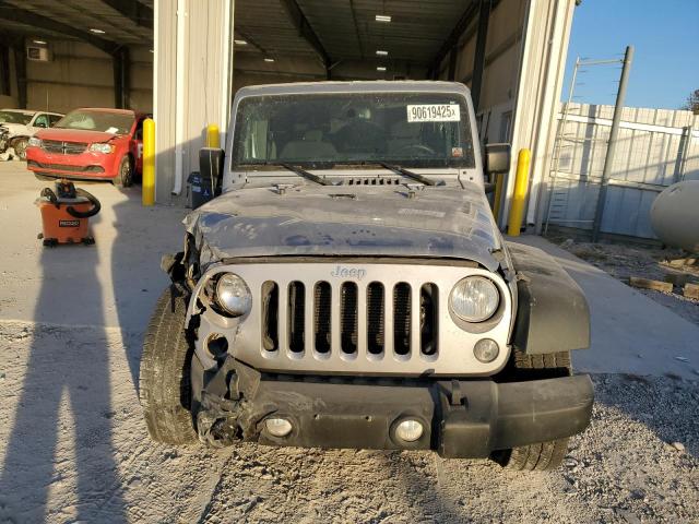 Photo 5 from auction – 2016 JEEP WRANGLER U with VIN 1C4BJWDG5GL138061