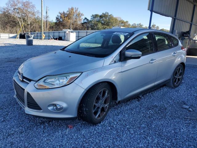 FORD FOCUS SE 2013 with VIN 1FADP3K26DL104077 - Photo from auction