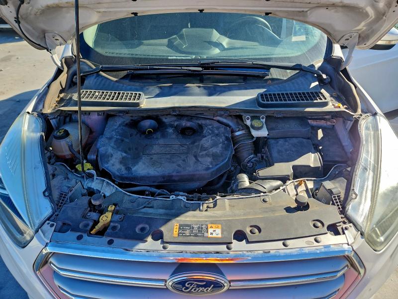 Photo 12 from auction – 2017 FORD ESCAPE TIT with VIN 1FMCU0J98HUD10069