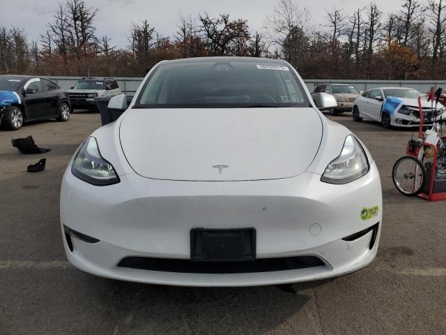 Photo 5 from auction – 2023 TESLA MODEL Y with VIN 7SAYGDED7PF962117
