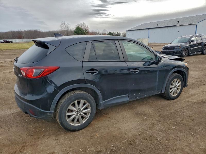 Photo 3 from auction – 2015 MAZDA CX-5 TOURI with VIN JM3KE4CY5F0440072