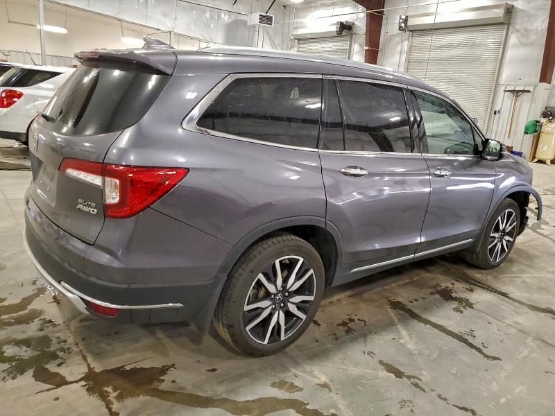 Photo 3 from auction – 2021 HONDA PILOT ELIT with VIN 5FNYF6H01MB005739