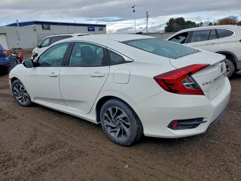 Photo 2 from auction – 2016 HONDA CIVIC with VIN 2HGFC2F84GH024870