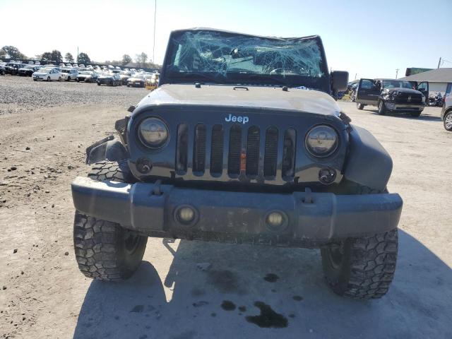 Photo 5 from auction – 2014 JEEP WRANGLER U with VIN 1C4BJWDG2EL313220