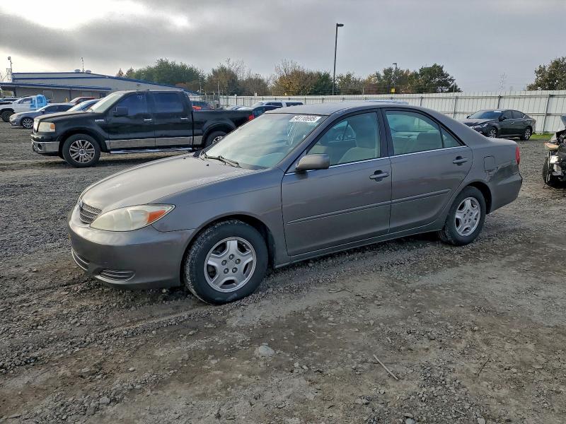 TOYOTA CAMRY LE 2003 with VIN 4T1BF30K33U560601 - Photo from auction