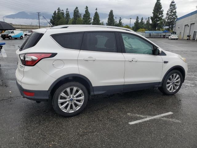 Photo 3 from auction – 2017 FORD ESCAPE TIT with VIN 1FMCU0J95HUD77115